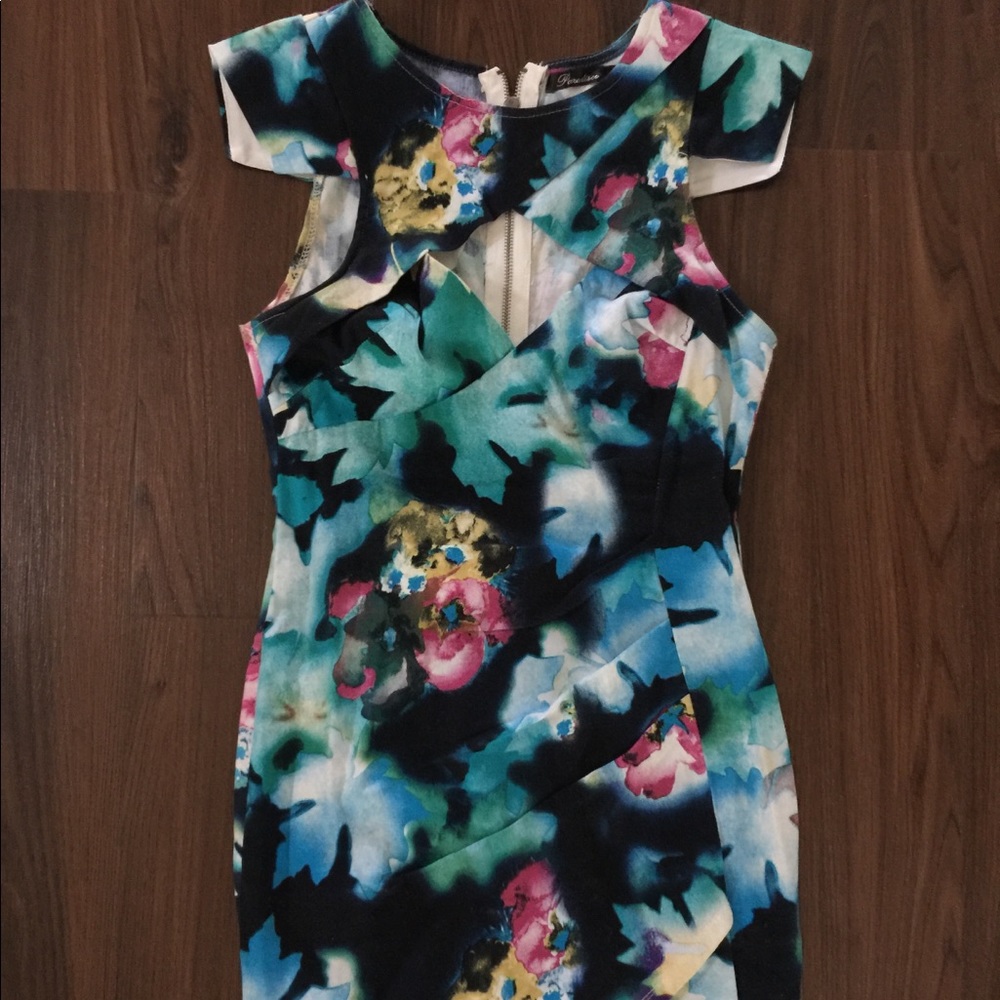 Paradise size AU 8 dress fits like a small